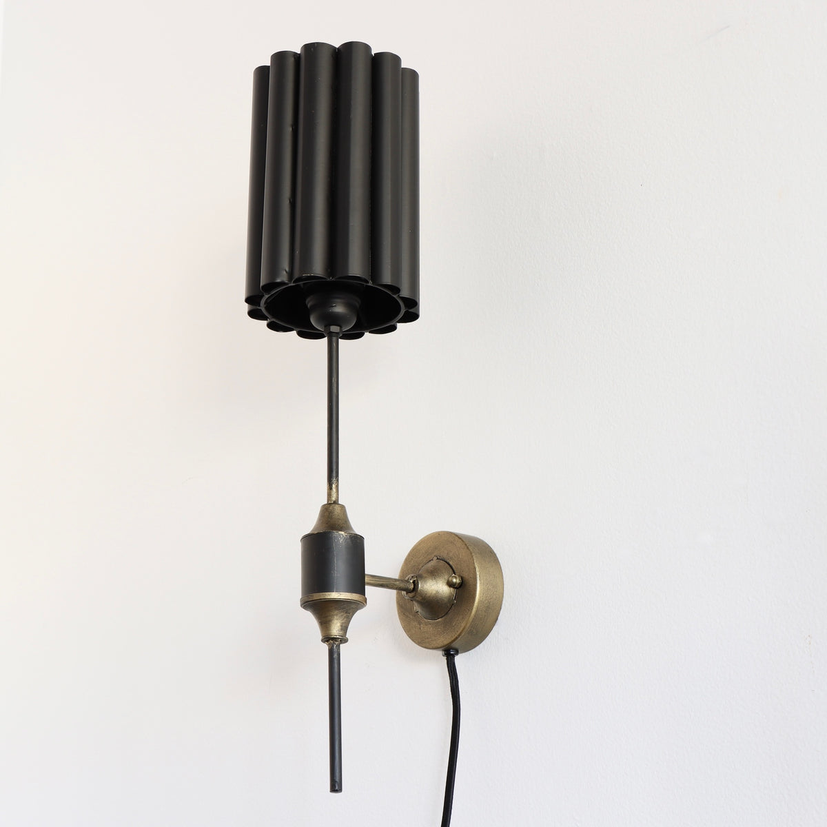 Kali Distressed Gold Wall Sconce with Black Fluted Shade - Holistic Habitat 